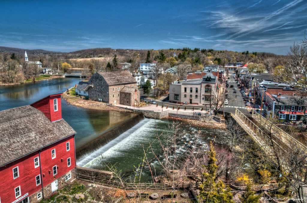 Aerial view of the Red Mill and the river with waterfall and downtown Clinton, NJ in the background